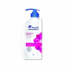 Head & Shoulders Smooth & Silky Anti Dandruff Shampoo, 1000ml bottle. Anti-dandruff shampoo formulated to help control dandruff while leaving hair smooth and silky. Large white bottle with a pump dispenser, pink accents, and the Head & Shoulders logo on the front.