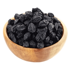 Black raisins in a close-up view, wrinkled dried grapes with a dark purple to black color, typically used as a sweet snack or baking ingredient.