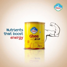 Kisan Ghee 450g jar, a 450g container of pure clarified butter in branded packaging, rich golden in color with a smooth texture, ideal for cooking, frying, baking, and traditional recipes.