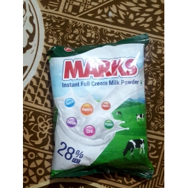 Marks Inst. Full Cream Milk Powder 500g – a sealed pouch or container of full cream instant milk powder, used for preparing milk drinks, tea, coffee, and cooking.