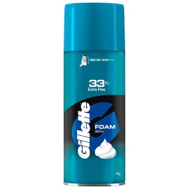 Gillette Foam Sensitive Shaving Foam, 418g aerosol can, formulated for sensitive skin to provide a rich, creamy lather that helps protect against razor irritation while ensuring a smooth, comfortable shave. White and blue can with Gillette branding.