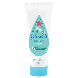 Johnson's Baby Skincare Cream Milk + Rice, 100g tube with white packaging, pink flip-top cap, and a baby illustration on the front. Moisturizing baby cream formulated with milk and rice ingredients for soft, nourished skin.