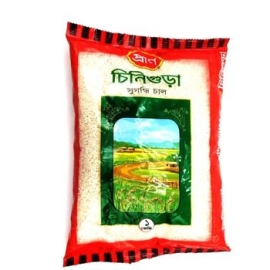 Pran Chinigura Rice Premium 1Kg pack featuring premium aromatic Chinigura rice with fine grains, rich natural fragrance, and a soft, flavorful texture ideal for traditional Bangladeshi dishes.