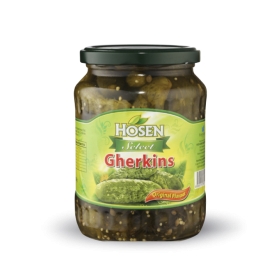 Hosen Gherkins Original 680g jar of crunchy pickled cucumbers preserved in vinegar with a tangy original flavor.