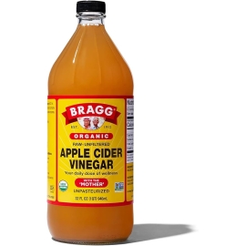 Bragg Organic Apple Cider Vinegar with The Mother 946ml bottle, made with organic apples and ideal for drinks, dressings, and cooking.